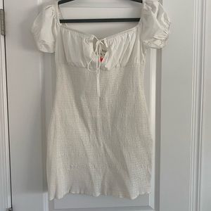Boutique white rouged dress